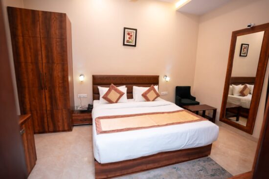 Modern furnished guest room at Hotel Radiance Courtyard